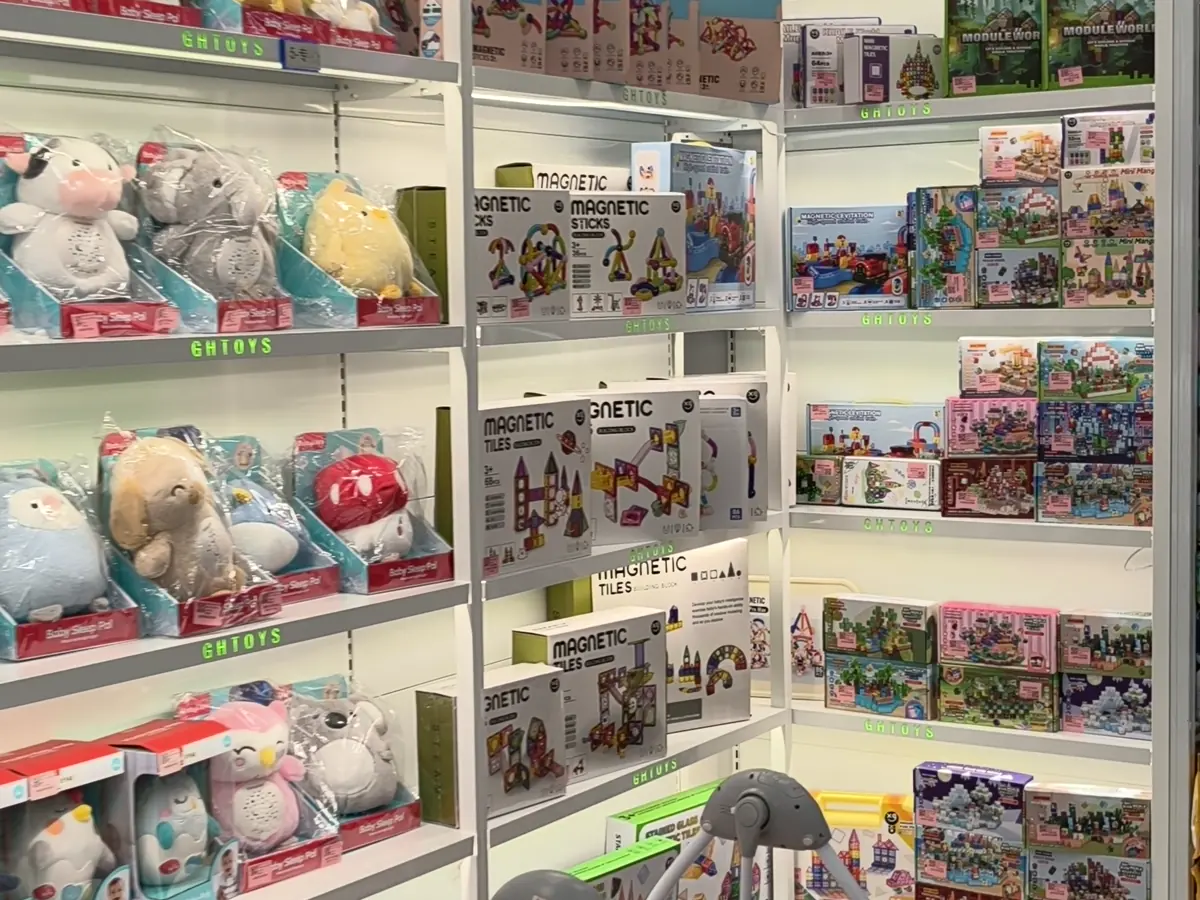 Dolls, baby and dress-up toys displayed in a Shantou showroom