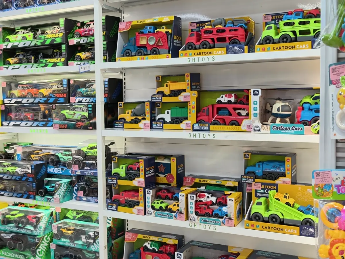 RC and electronic toy cars displayed in a Shantou showroom